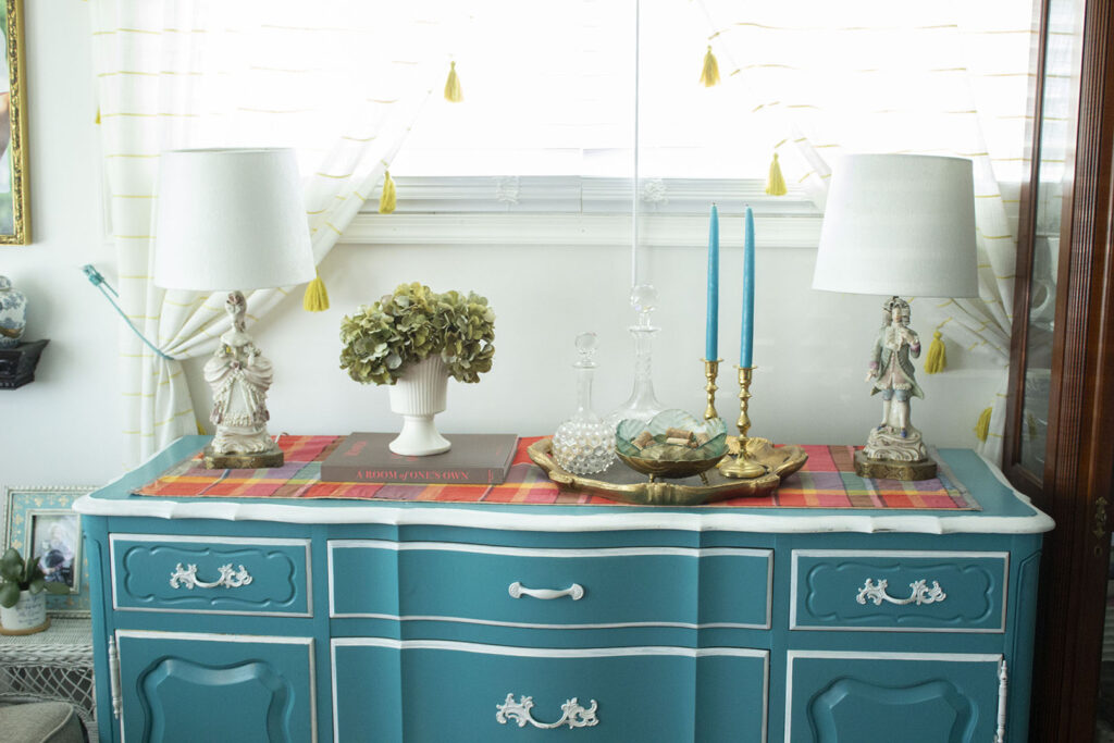 Turquoise blue buffet table  styled with French figurine lamps and hydrangeas