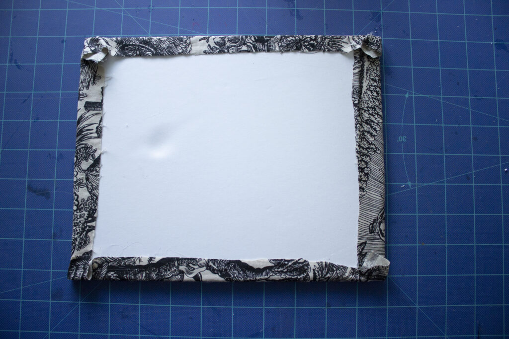 Gluing Fabric Around White Board