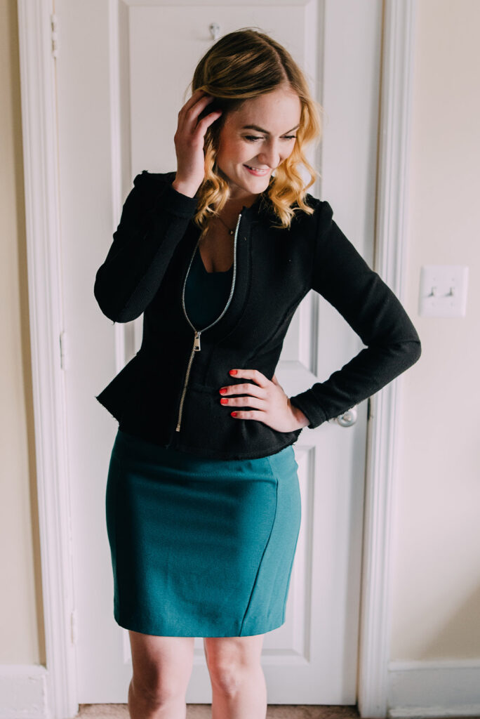 Woman in Black Peplum Blazer