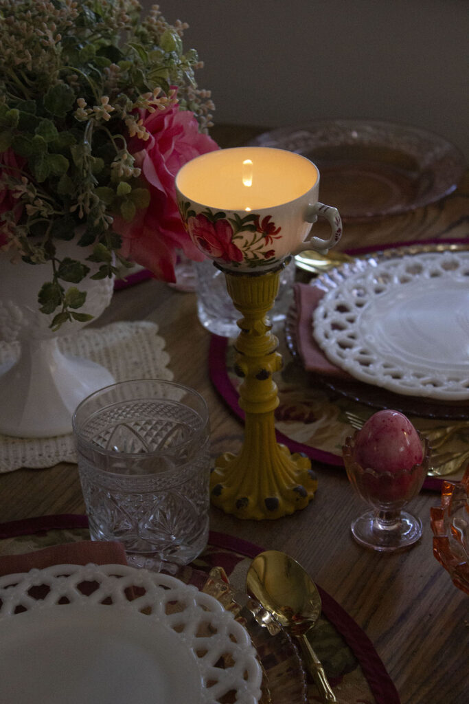 Teacup Candlestick Glowing with Light