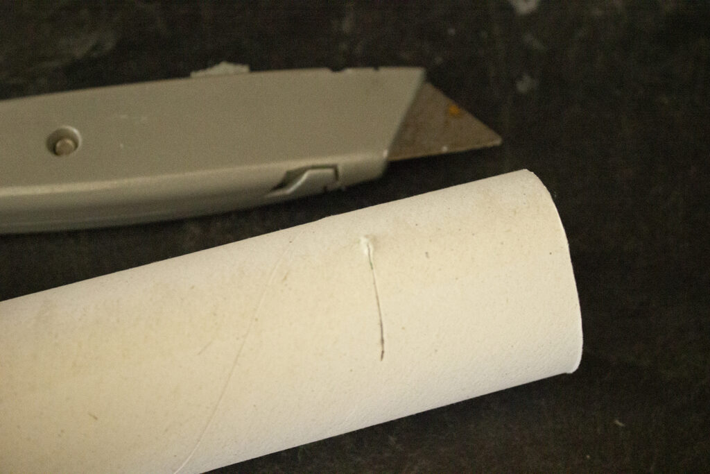 Slit in paper towel tube