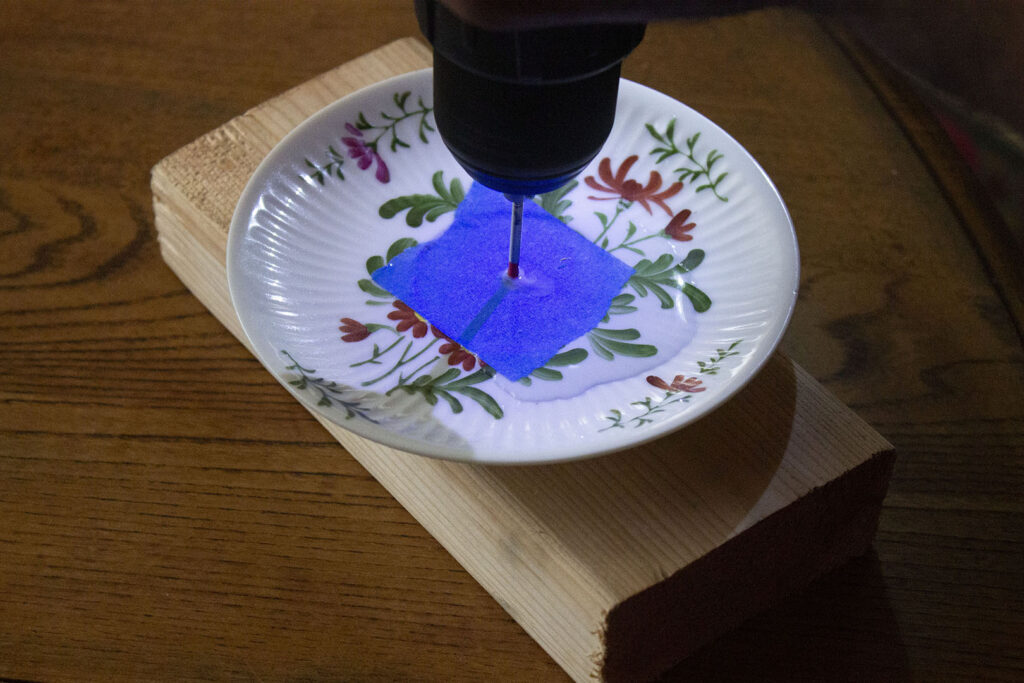 drilling through a plate with a 1/8 inch drill bit