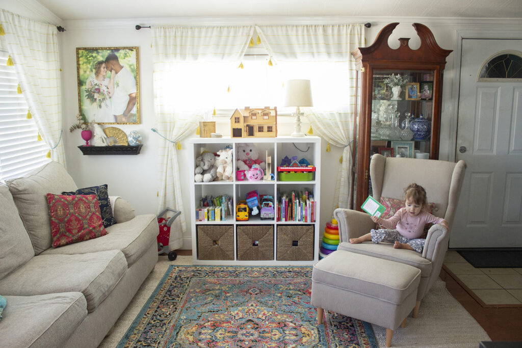 Living Room with shelves full of toys