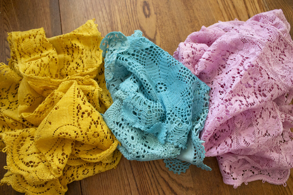 How to Use Vintage Doilies: Three Piles of Dyed Doilies