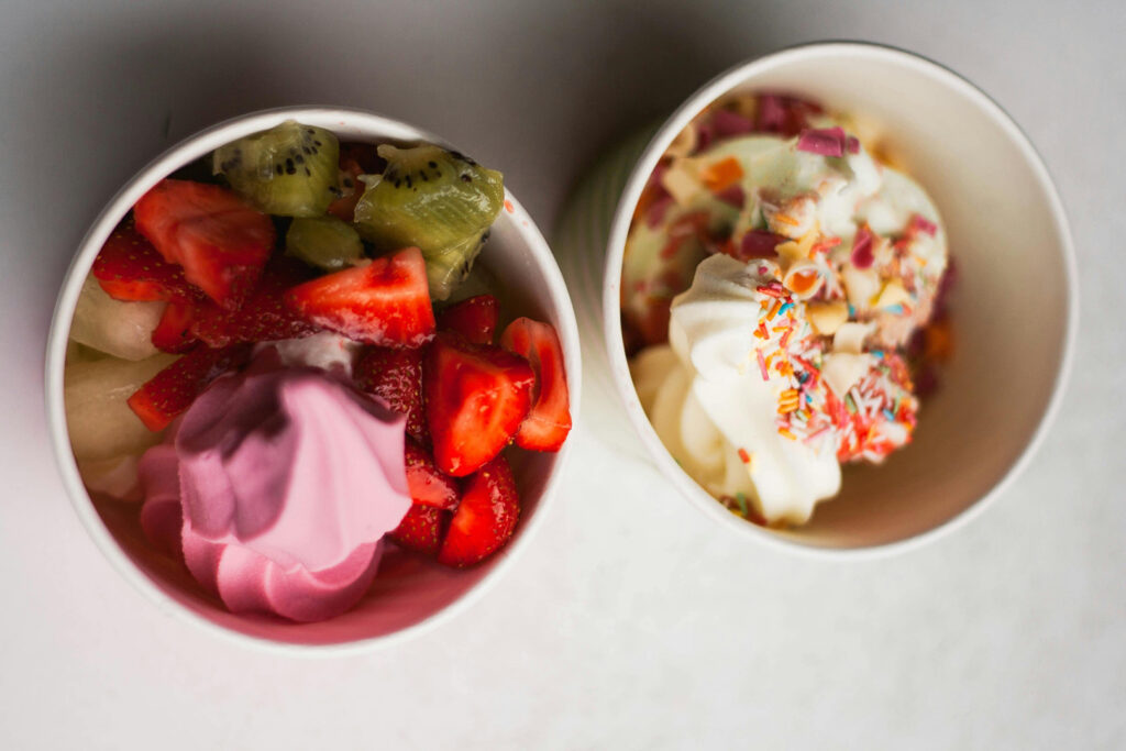 Two cups of frozen yogurt with fruit