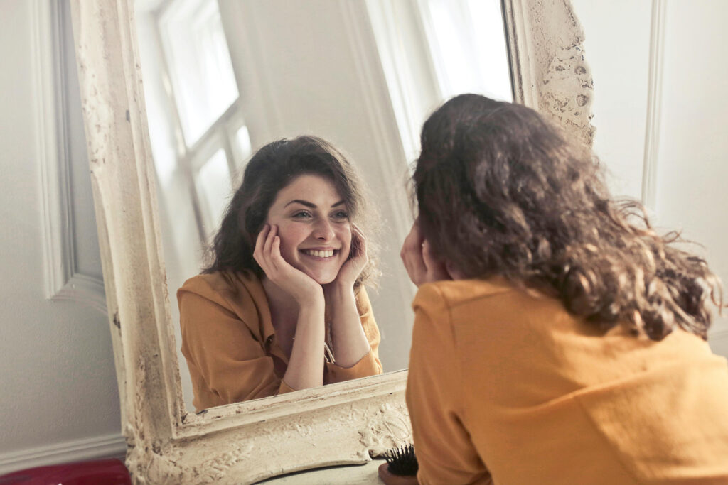 How to Overcome Anxiety: Woman Looking in Mirror
