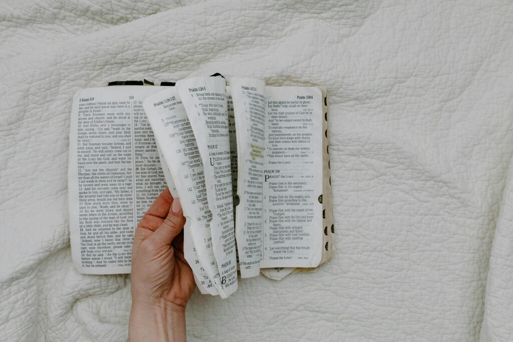 Saved by Grace: Bible open on bed