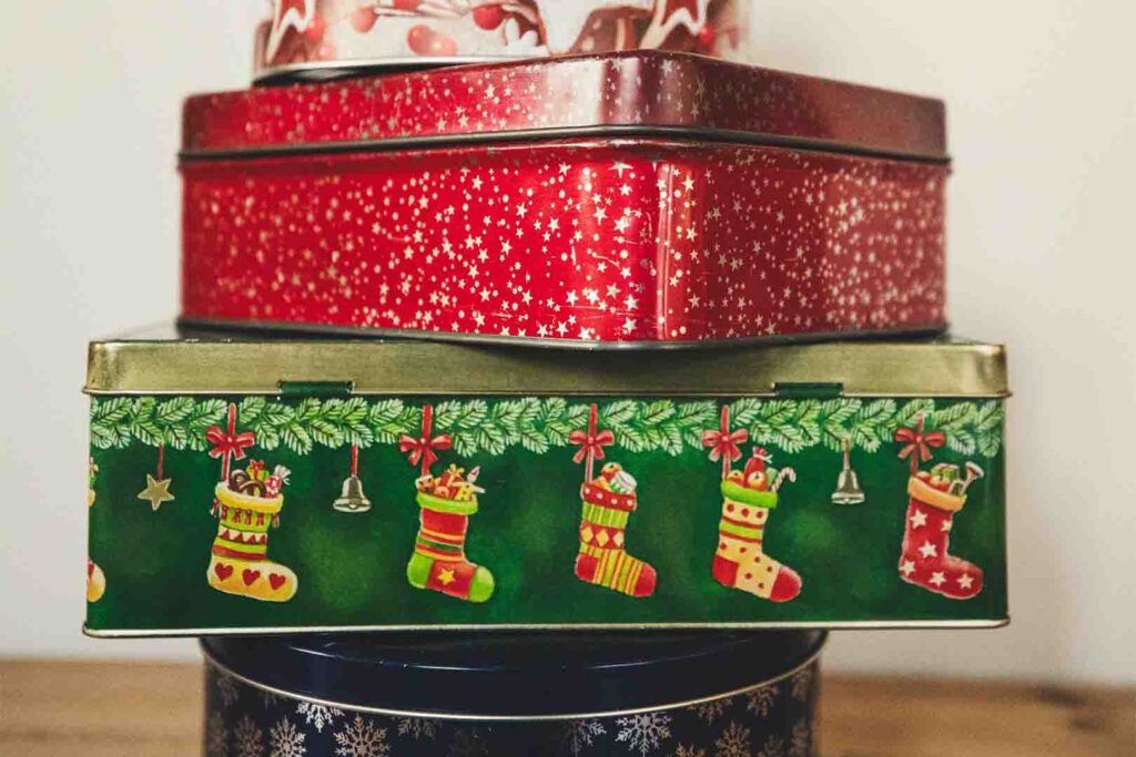 Homemade Christmas gifts: stack of holiday tins