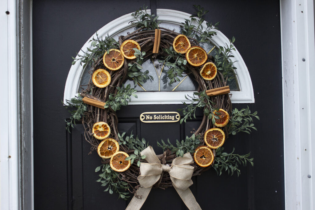 Dried Orange Wreath Hanging on front door